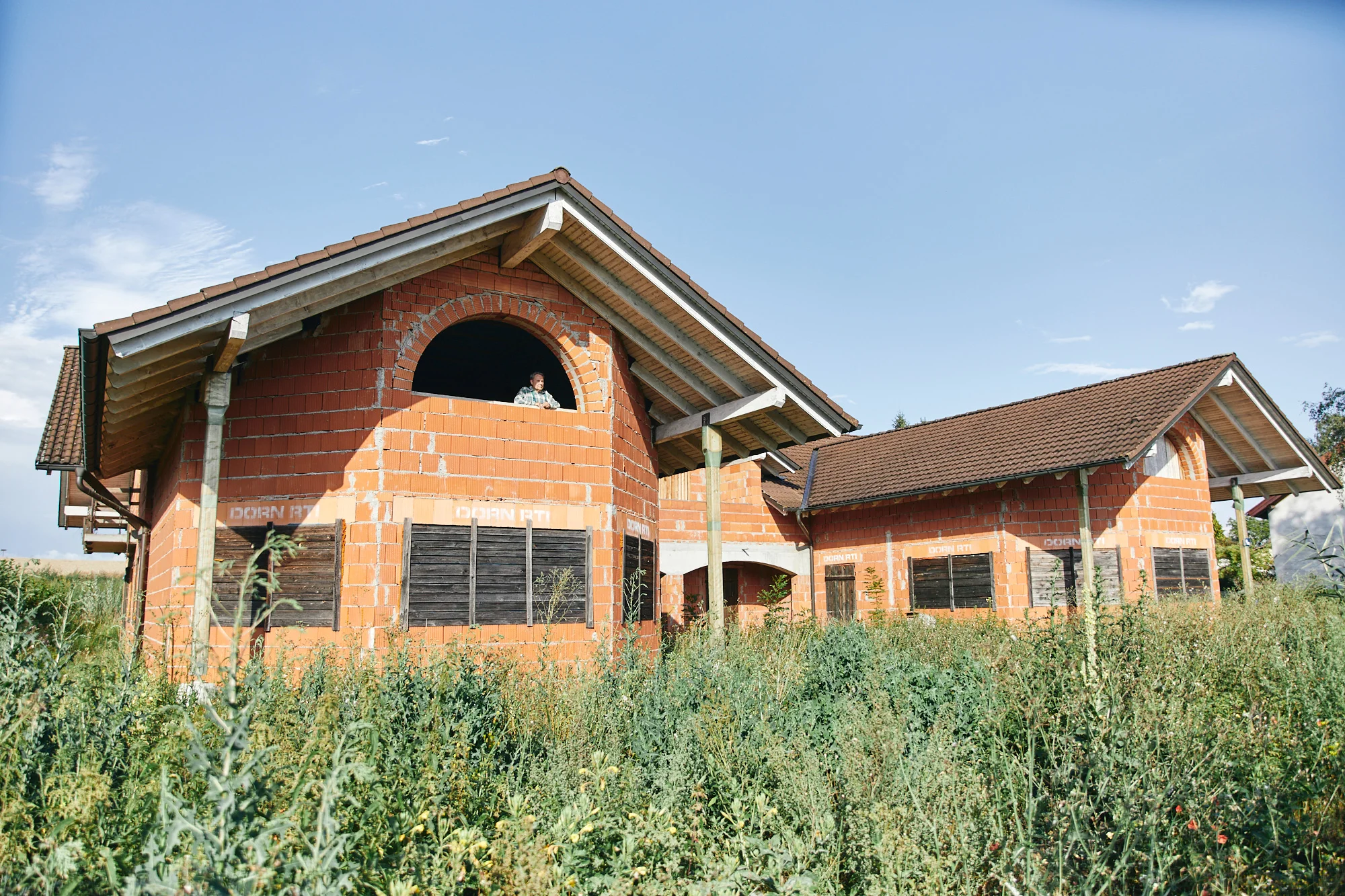 A blind man building his own house
