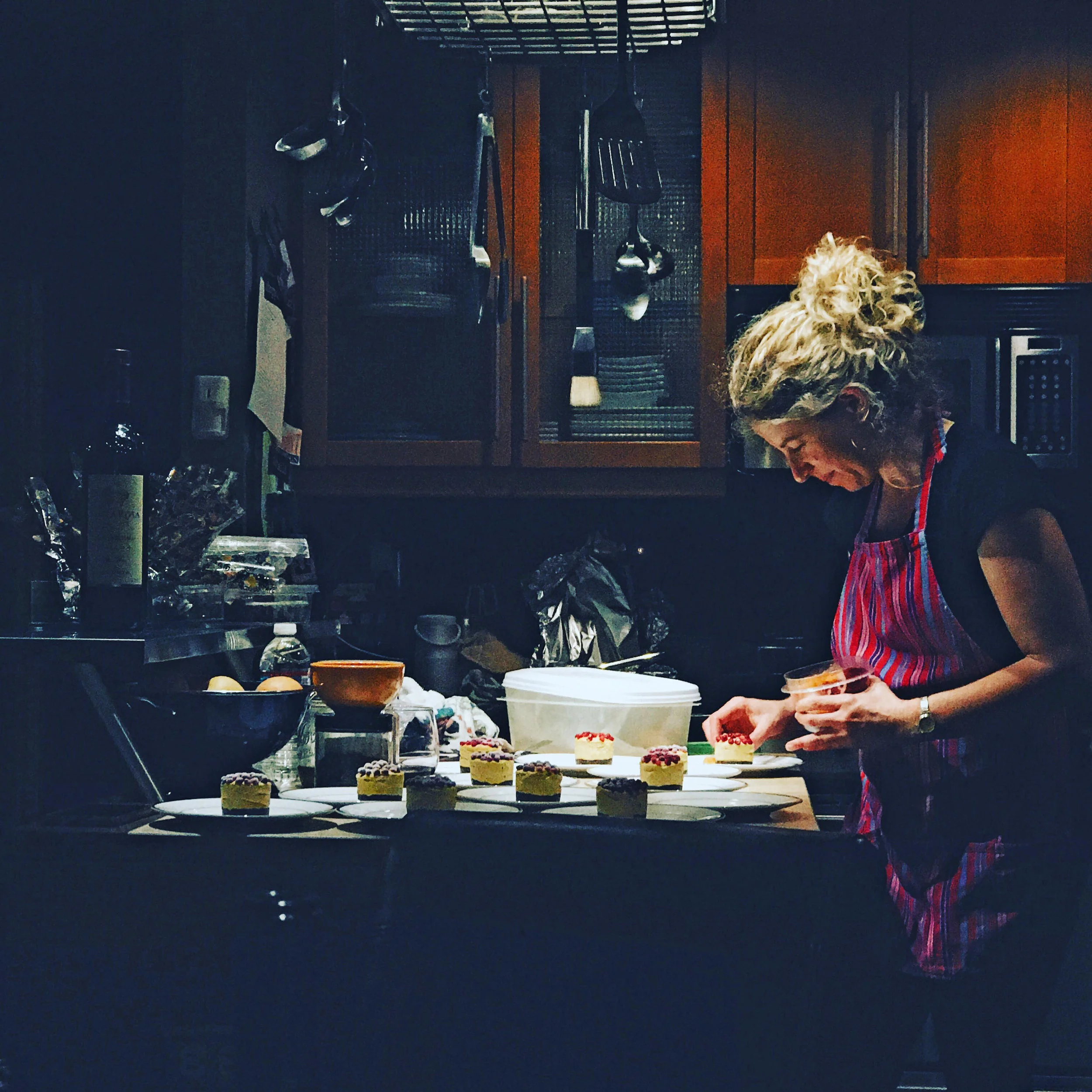 Jennifer from FoodSoulutions Cooking in Kitchen.jpg