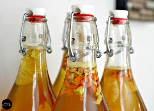 Ginger and Turmeric Kombucha by All the Nourishing Things