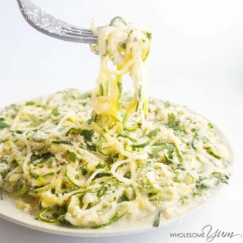 Zucchini Noodles Recipe with Healthy Alfredo Sauce by Wholesome Yum