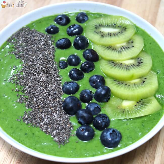 SUPERFOOD JUNGLE GREEN SMOOTHIE BOWL by In the Kids Kitchen “A jungle green smoothie bowl is the perfect solution to get your kids filled to the brim with the goodness of greens! This tasty bowl contains a full serving of veggies plus a beneficial blend of healthy fats and proteins.”