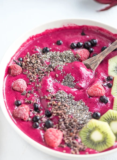 STRAWBERRY BEET SMOOTHIE BOWL (VEGAN) by Running on Real Food “This bright and beautiful beet smoothie is loaded with nutrients and high in protein and fibre. Enjoy it as an ice cream-like smoothie bowl with your favourite toppings or increase the liquid and pour it into a big glass and enjoy with a straw.”