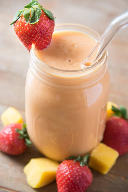 Strawberry Mango Smoothie by Know Your Produce Boost your children's Vitamin C with this vitamin-rich smoothie. It's fruity and nutritious!