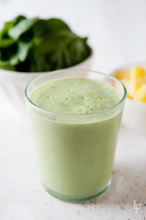 Pineapple Green Smoothie by Laura Fuentes Created by a mom on a mission to convince her kiddos to eat more vegetables, this smoothie is a true crowd pleaser!