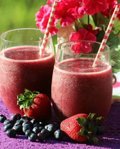 Easy Berry Green Smoothie by Dancing Through the Rain “This easy Berry Green Smoothie is the one that has worked best for my family. My daughter likes it just as it is and my son prefers it with no blueberries, but what is most important is that no one notices the kale.” - Dancing Through the Rain