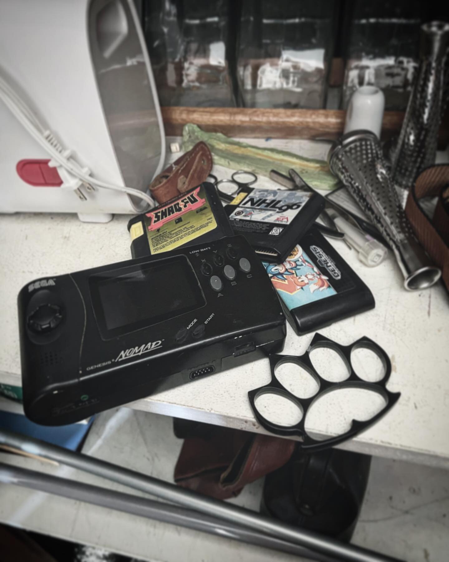 Looking for an XLR cable at my pop&rsquo;s&hellip;. Found a Sega Nomad with Shaq-Fu and brass knuckles&hellip;. My youth was a bit much.