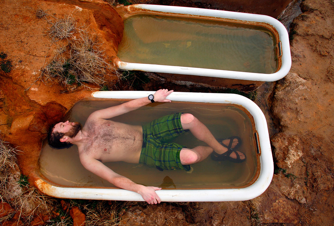 Jake Butz relaxes at Mystic Hot Springs in Monroe, Utah.