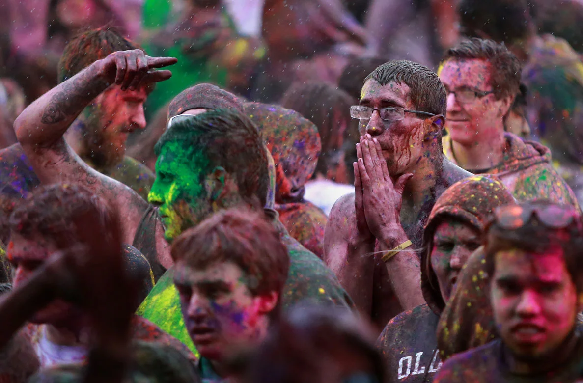 Rain and colors mix at the Holi Festival of Colors at the Sri Sri Radha Krishna Temple in Spanish Fork on Sunday, March 30, 2014.