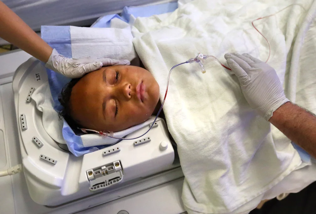  Lota Ward is prepped for an MRI to see how he's doing after his fourth brain surgery for a teratoma tumor at Primary Children's Hospital in Salt Lake City on Thursday, April 2, 2015.  