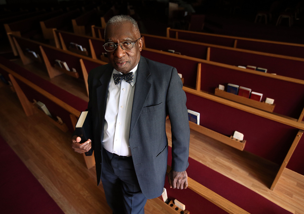  Pastor France A. Davis poses for a portrait at Calvary Baptist Church in Salt Lake City. 