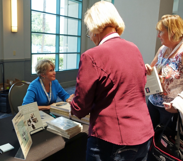 Signing books after speaking at Jamboree, the Southern California Genealogy Society's BIG annual conference