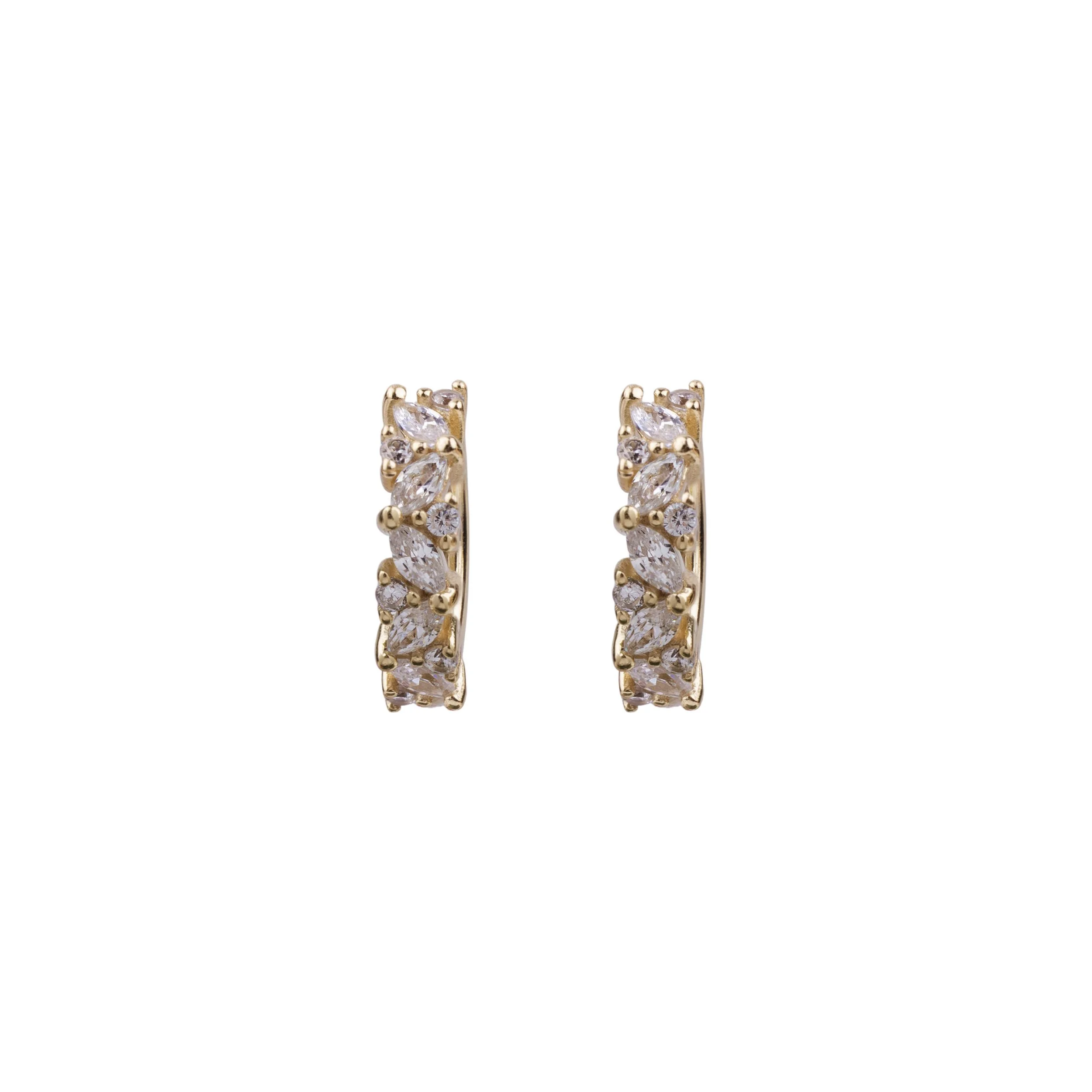 e-commerce product photography and jewelry photography of  gold huggy earrings by Melanie Auld