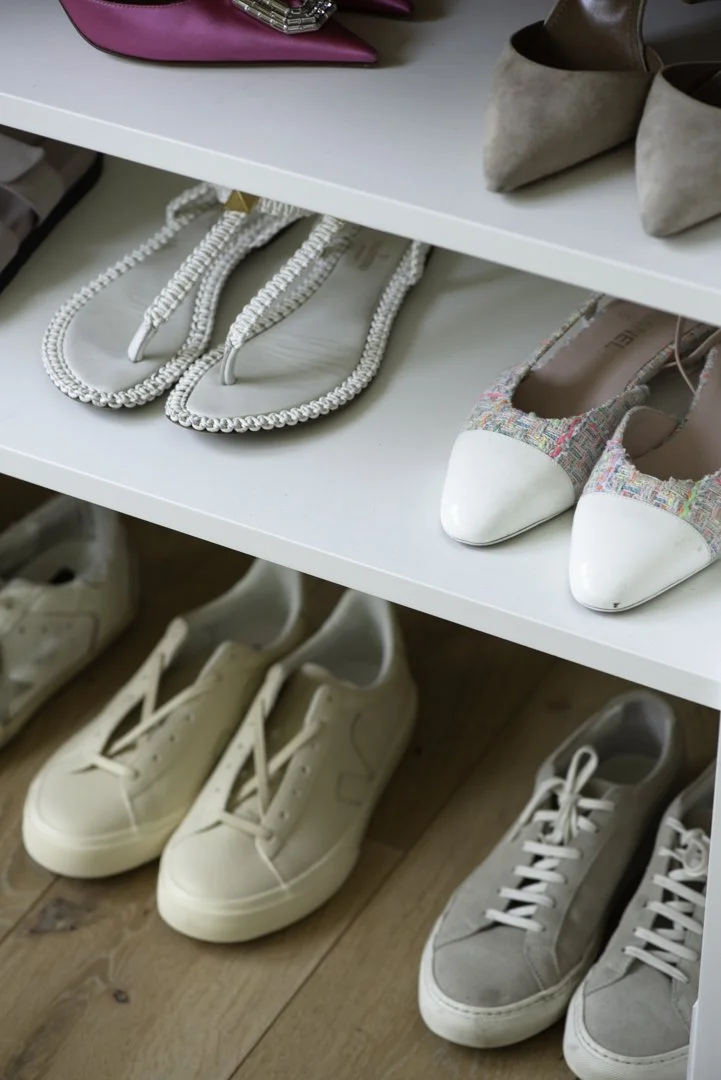 product photography and interior photography of luxury shoes in a shoe closet