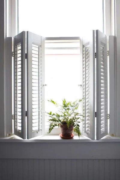 Half height plantation shutters allow the best of both worlds in terms of giving a classic look, while still allowing precious natural light to flood in.