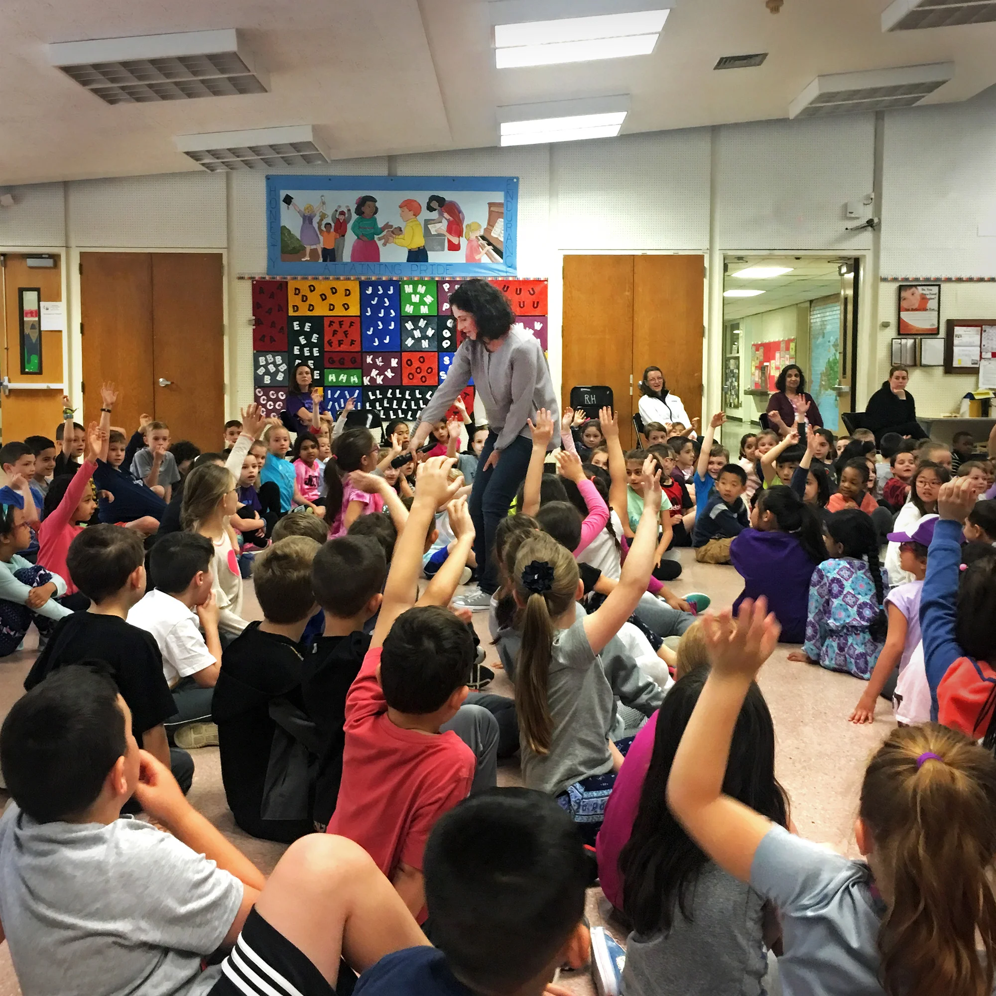 Working the K through 2 crowd with the mic at Rolling Hills Primary | Photo courtesy of Jen Ryan