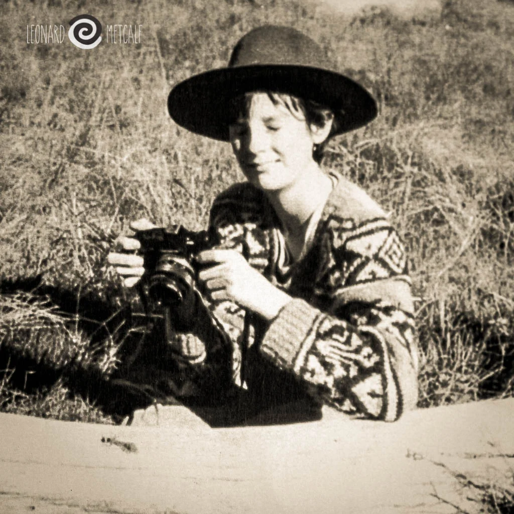With the Olympus OM-1 and me with closed eyes.. Photograph Murray Metcalf circa 1975