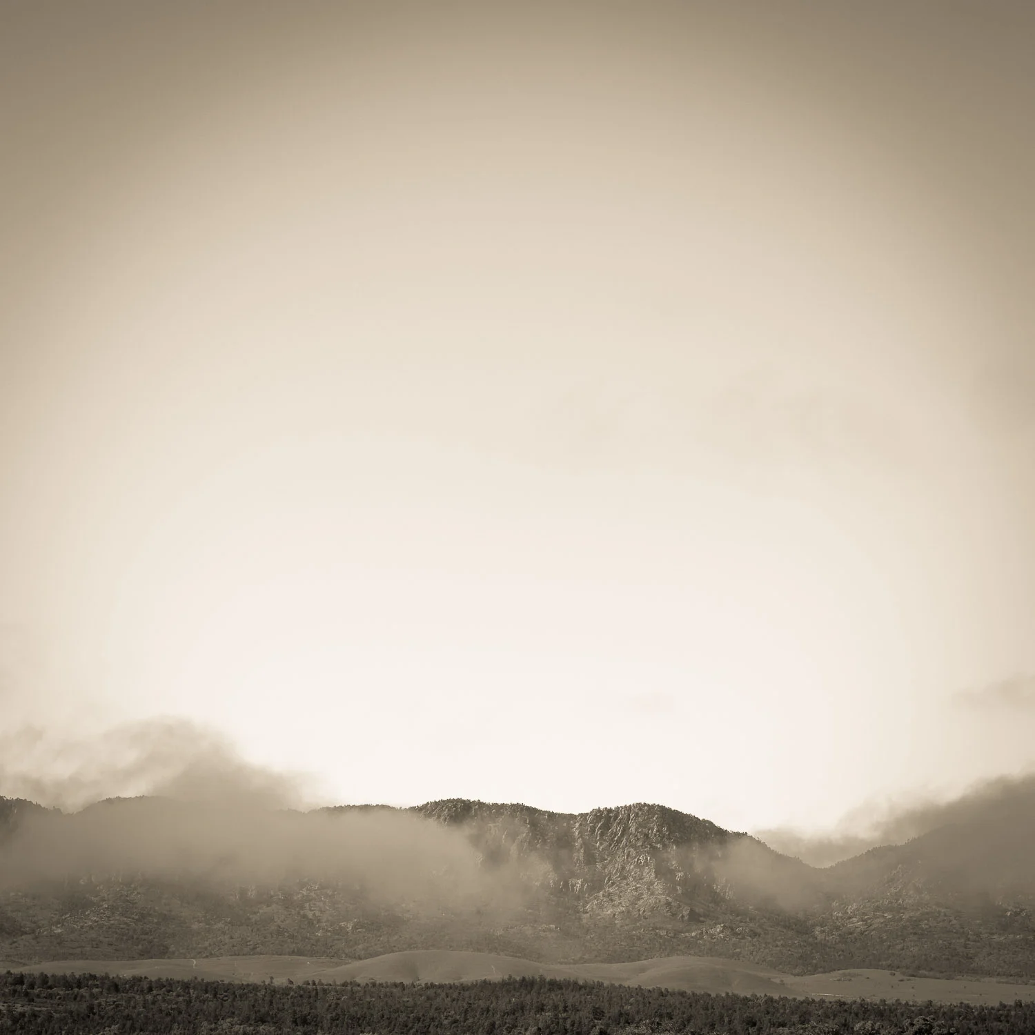 Mist graces an early morning near Wilpena Pound, the Flinders Ranges, South Australia © Len Metcalf 2015