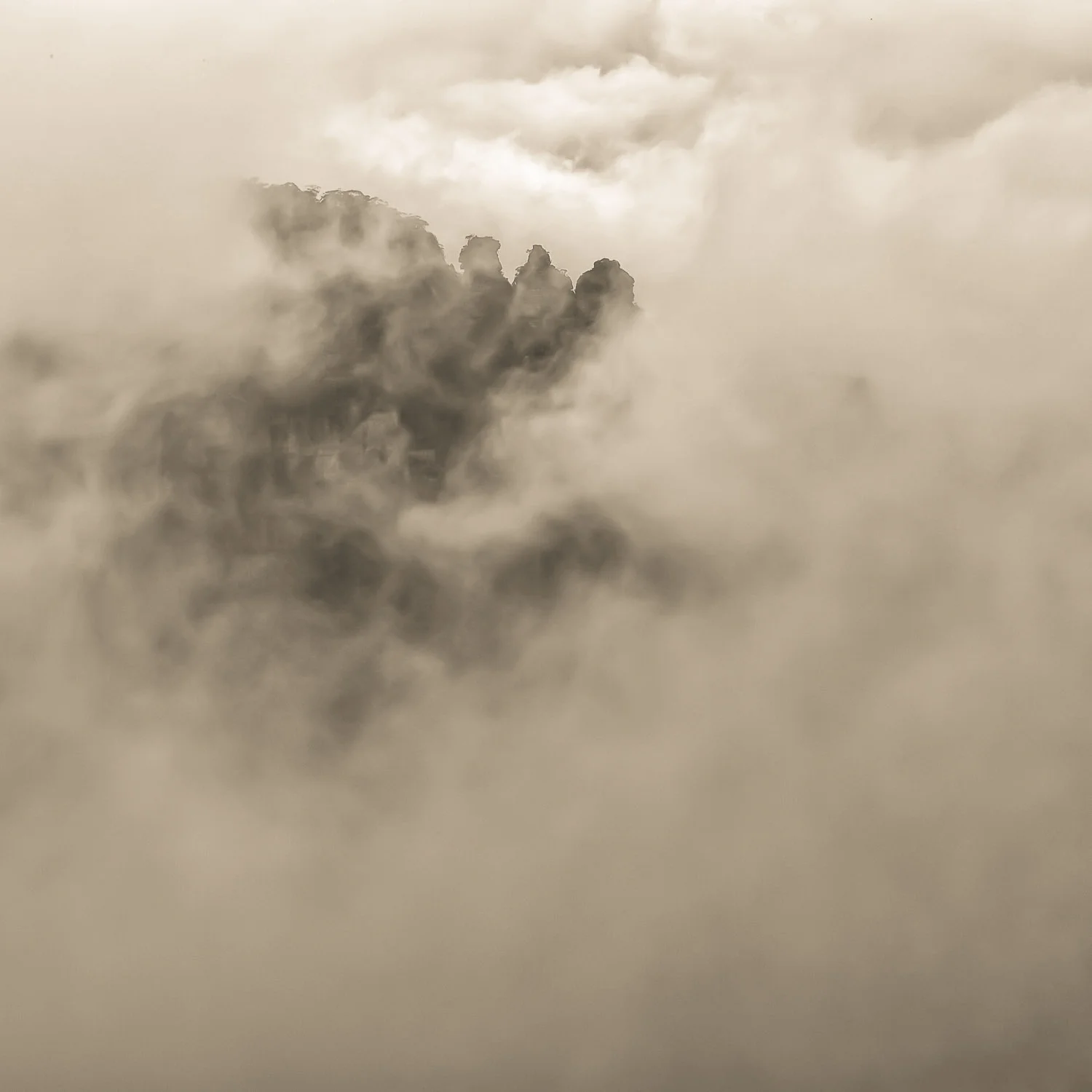 The Three Sisters shrouded in mist, Copyright © Len Metcalf