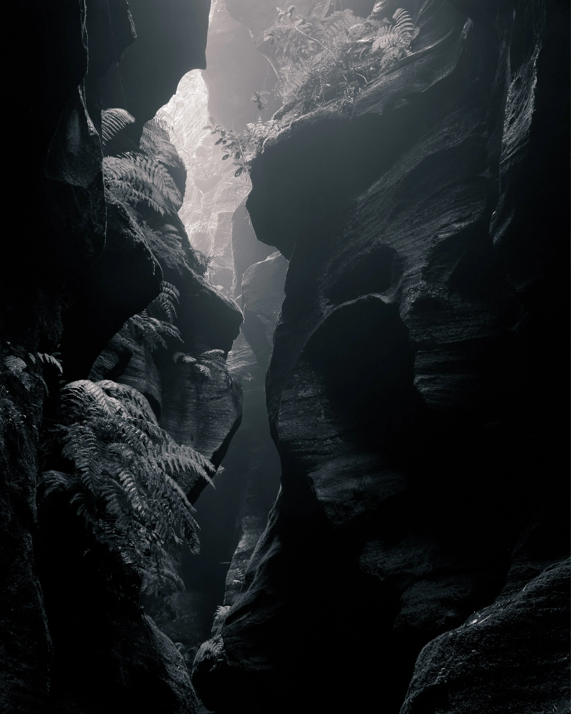 In terms of tones, things tend to get lighter in the distance. This is because they are less contrasty as the light travels through the atmosphere. Though in this photograph it is caused by the light being brighter in the background. This increases the perceived sense of depth.