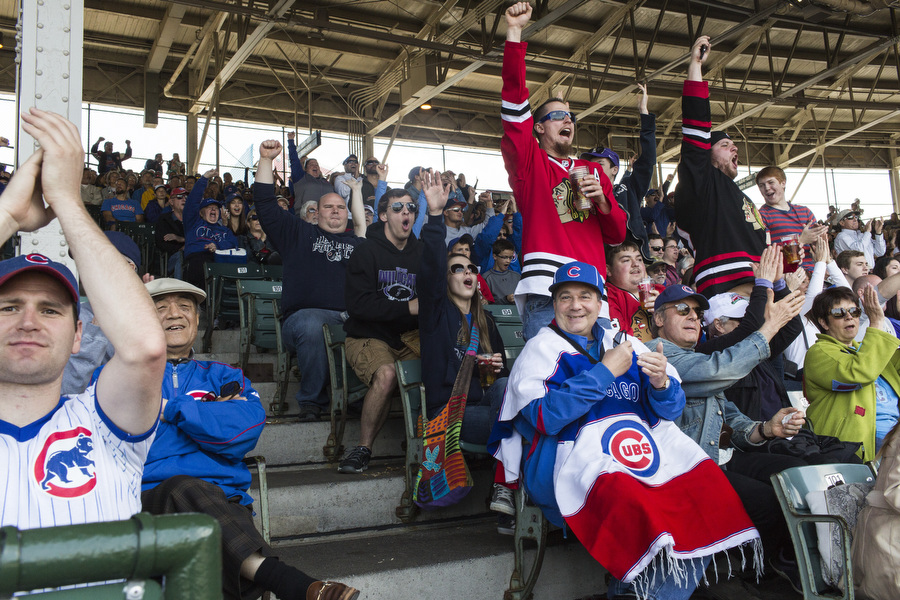 Fans cheer as Mike Olt hits a home run.
