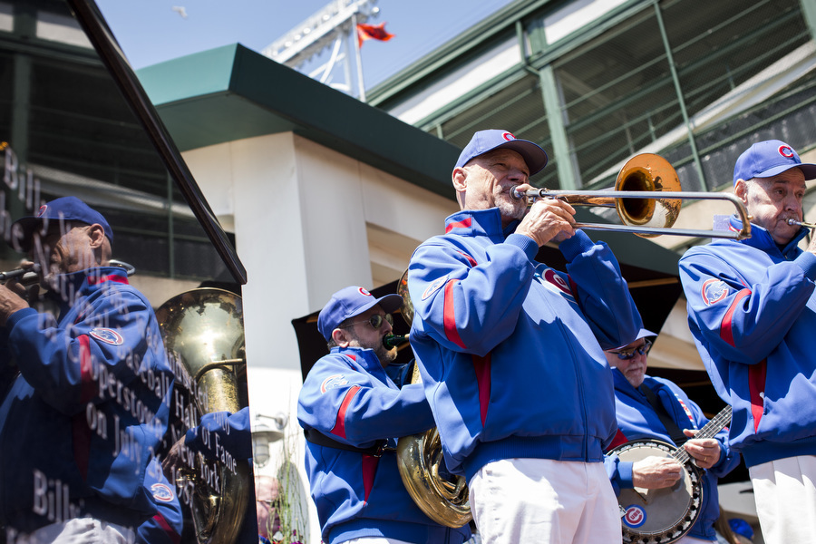 The Cubs Dixieland Band plays before the game. They've been performing at Wrigley Field for 33 years. 