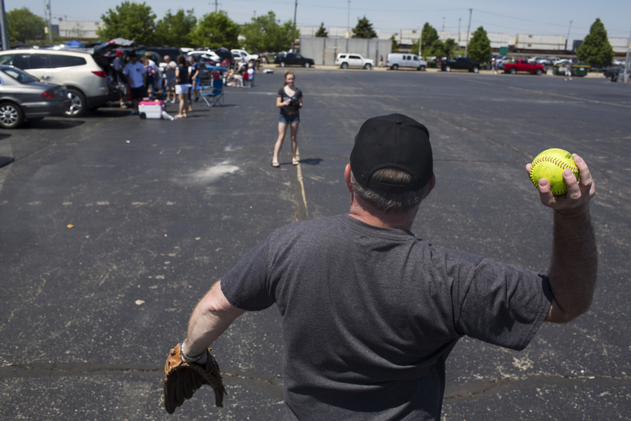 Brian Bonchick plays catch with his daughter Amanda before the game.