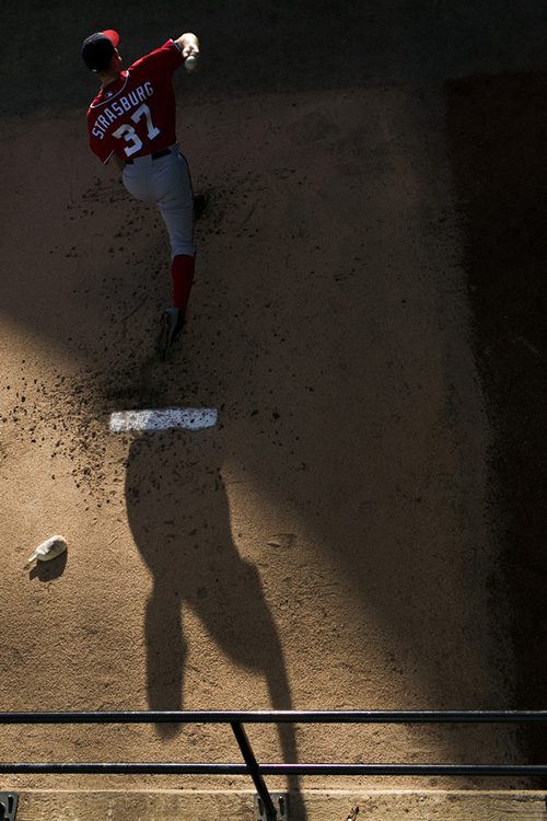 Stephen Strasburg warms up. 