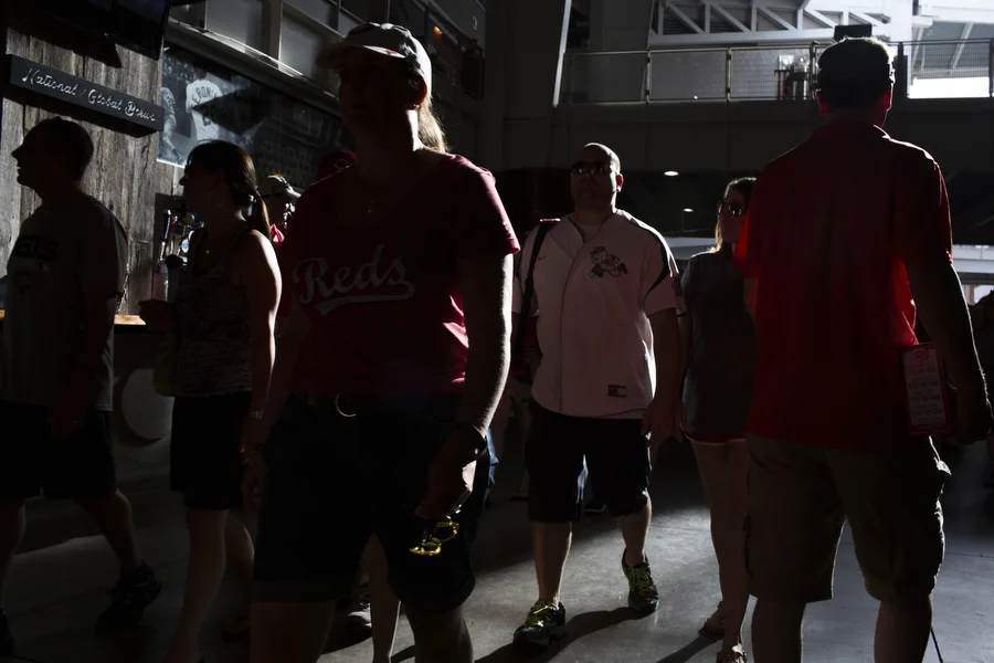 Fans walk on the 100 level concourse. 