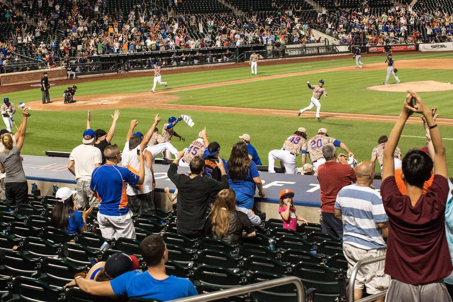 Mets shortstop Ruben Tejada singles home the winning run in the 11th inning. 