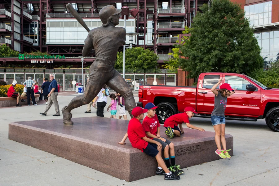 A ten-foot tall statue of Phillies great Mike Schmidt stands in front of the third base gate. 