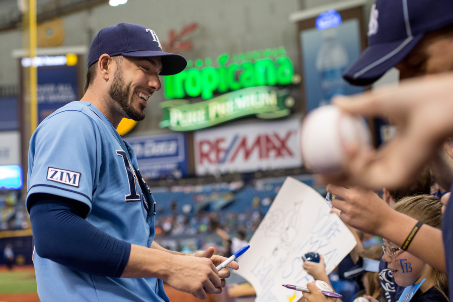Outfielder Matt Joyce signs autographs.