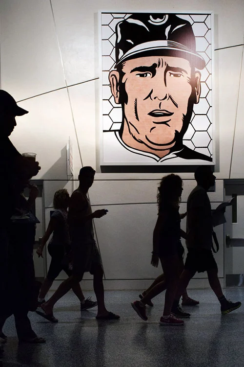 A reproduction of Roy Lichtenstein's " The Manager" from 1963 hangs in the stadium. Marlins owner Loria is a modern art dealer and the stadiums has several modern art pieces displayed around the stadium. 