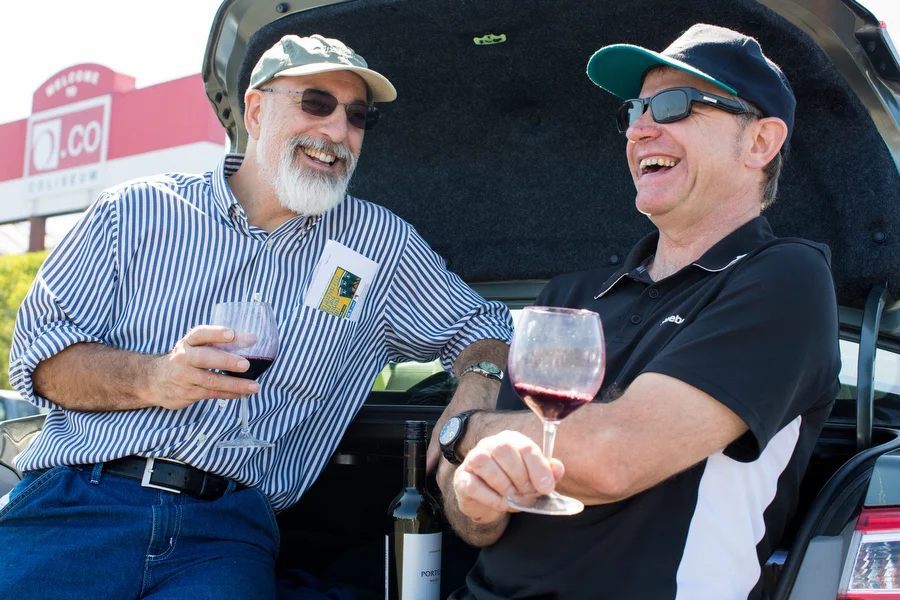 Paul Vossen of Santa Rosa and Richard Gawel of Adelaide, Australia drink wine before the game. It was Gawel's first game. 