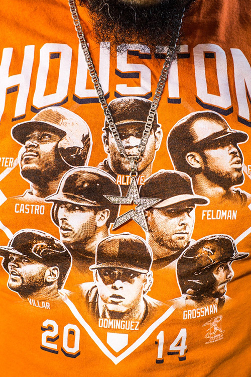 Tony Solis wears a chain with a medallion in the shape of the Astros logo that his dad purchased for his birthday.