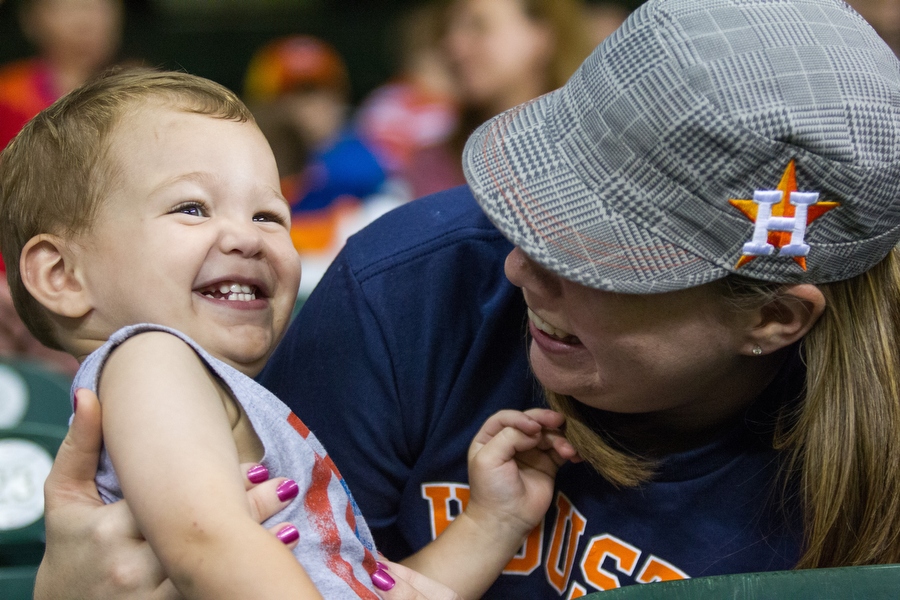 Samantha and Cooper, 2, share a laugh after singing "Deep In the Heart of Texas."