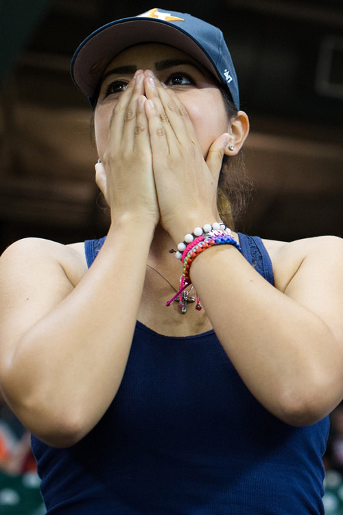 April reacts after the Astros relinquish the lead to the A's.