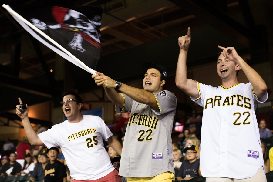 From left, Michael, Nick and Matt cheer on the Pirates.