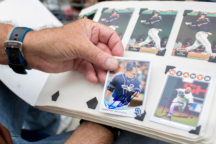 Mike Bowman is a hobbyist card collector. He arrives early to most games with a book full of cards of former and current Padres players and coaches. The majority of the cards he gets signed will never have much value but he said he enjoys collecting the cards and often gives cards and balls away to fans. 