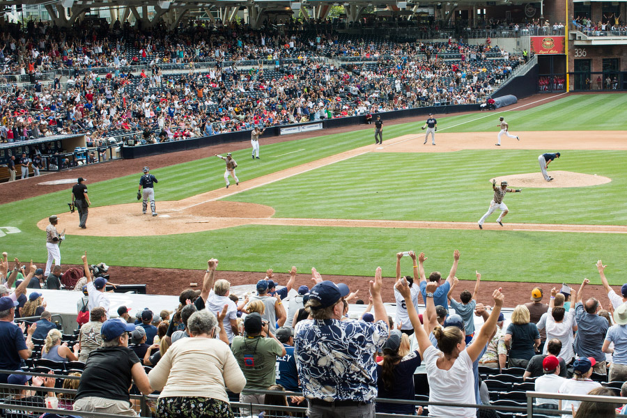 Shortstop Everth Cabrera raises his hands after hitting the game-winning single in the 10th inning to beat the Braves. 