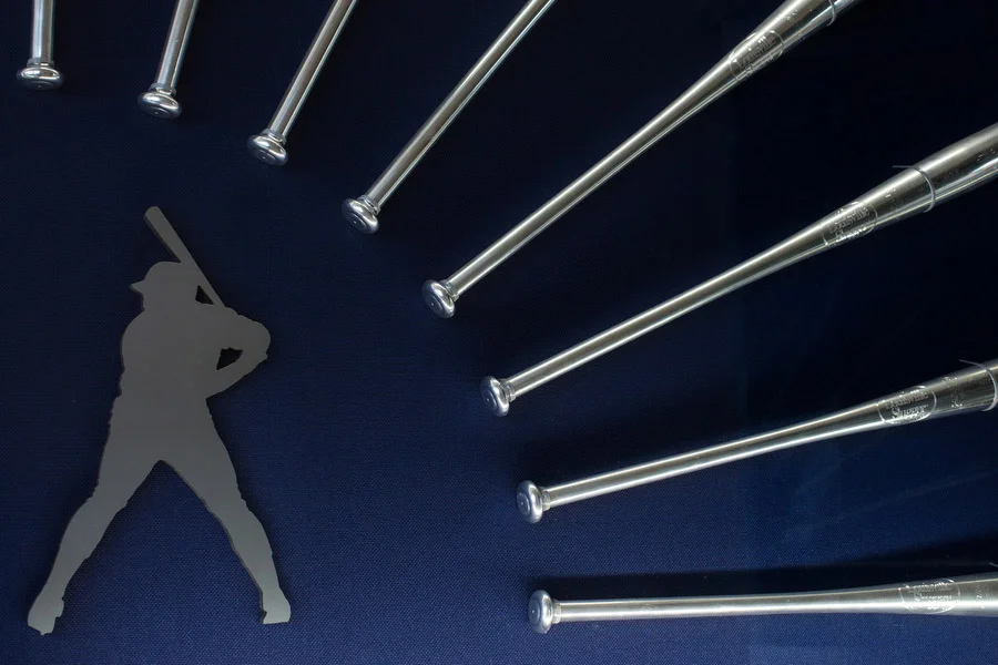Inside Club 19, a bar and restaurant named after "Mr. Padre," Tony Gwynn, eight silver bats line the wall. The bats represent the number of times Gwynn won the batting title. 