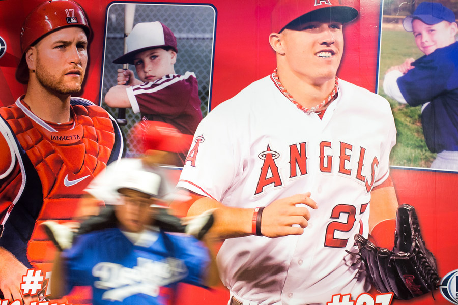 One the wall is a poster with photos of when current Angels Mike Trout and Chris Iannetta played in little league.
