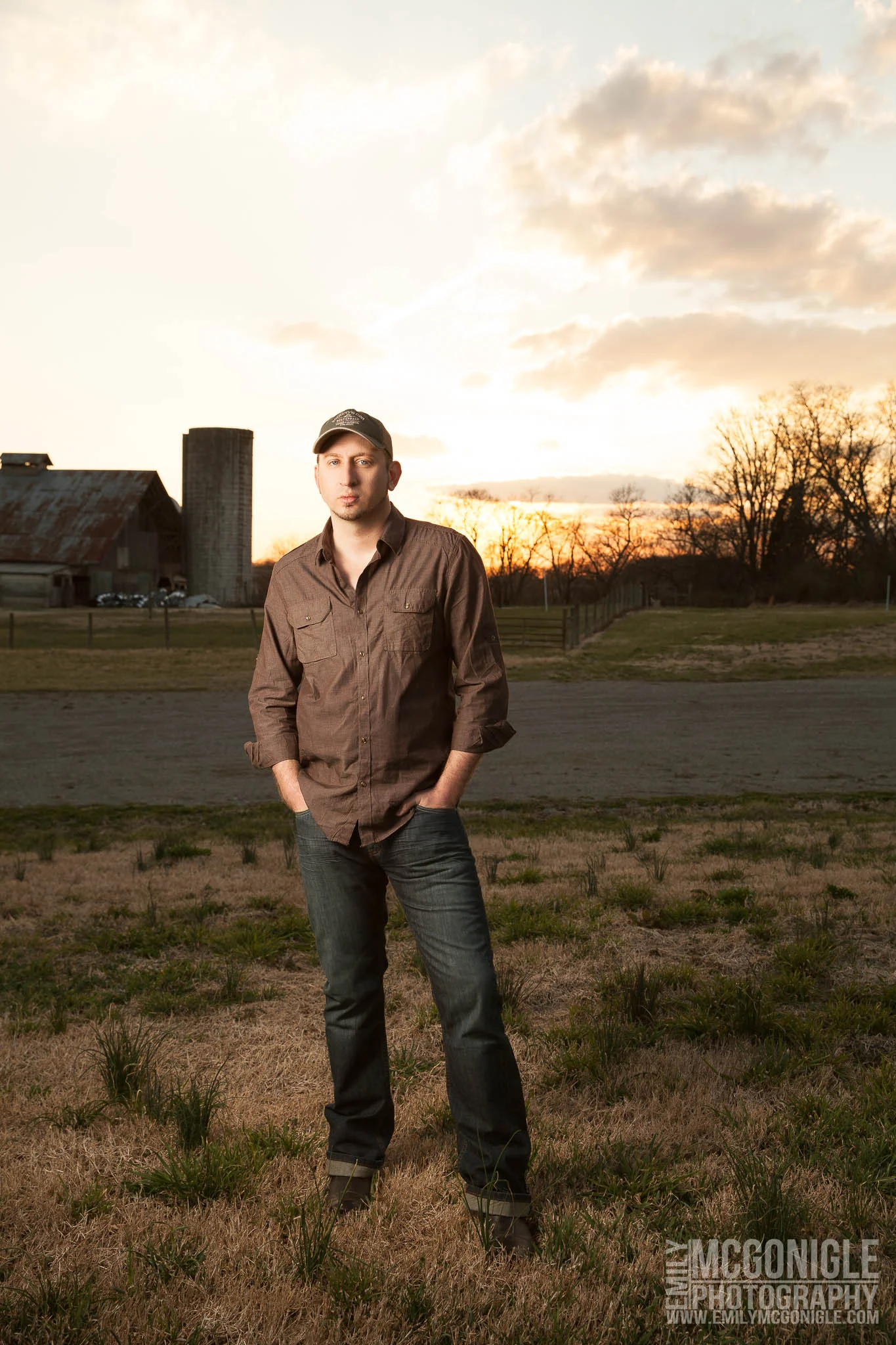 portrait in a farm field at sunset