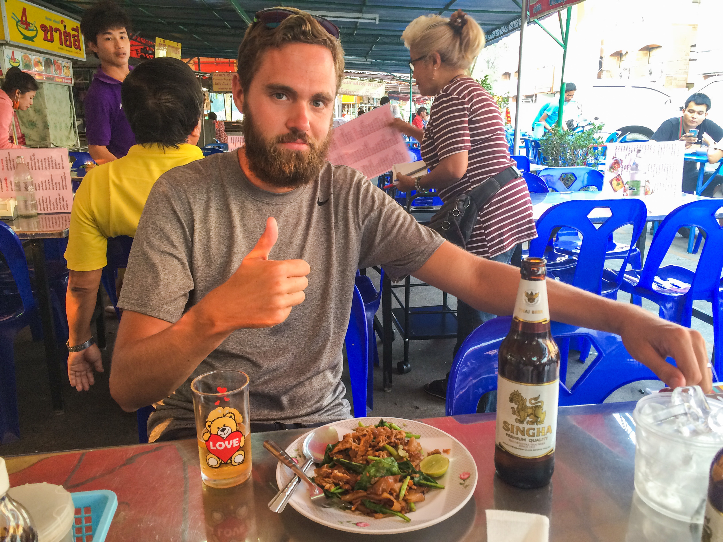 Alex with pad see ew - his new favorite Thai dish.