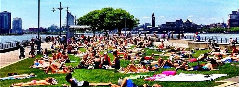Sunbathers at Pier 45 on a sunny weekend afternoon.