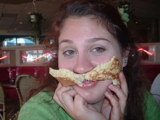 My bud Jess, enjoying a simply elegant pancake.