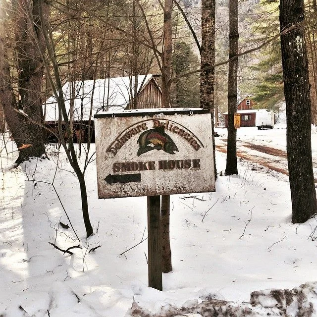 These wooden signs are pretty much all you have to go by on the dirt road.