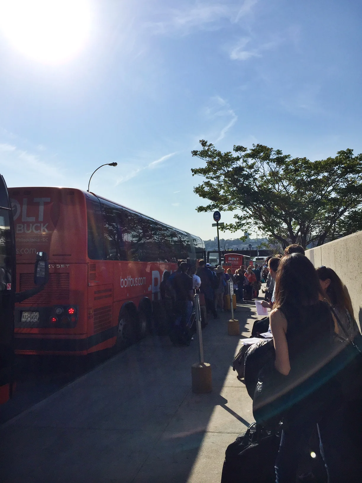The busses and passengers stretched for over three blocks.