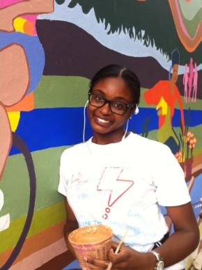 Trevonna in front of the New Mural at Isham Park