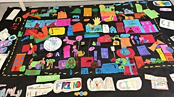 The completed community mural from the Saturday "Art Around the World" program at Inwood Public Library. 