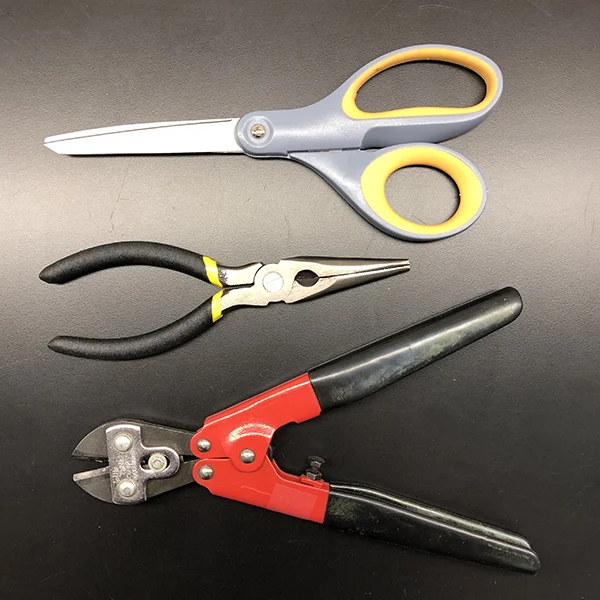You will need a pair of scissors , a wire cutter and a pair of pliers . Needle-nose pliers make nice round curves, but regular pliers will do the trick.